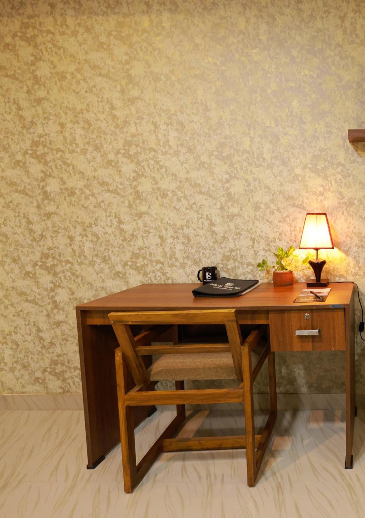 Builda Park inn Ottappalam Bagian luar foto